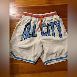 Just Don White and Blue Athletic Shorts with Orange Accents